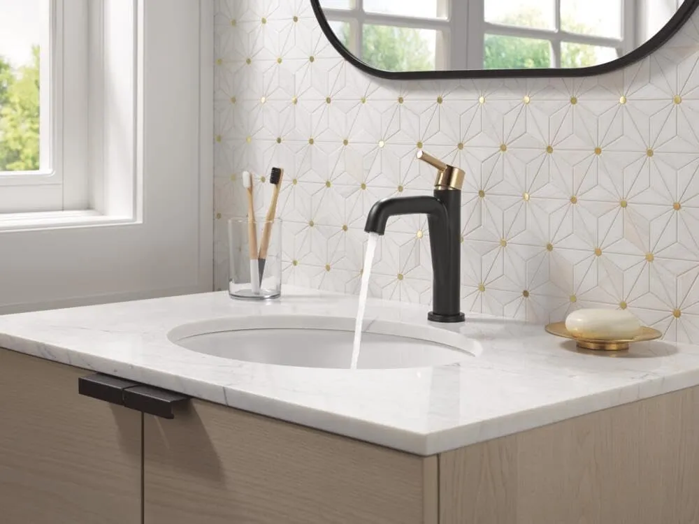 Delta Nicoli Matte Black/ Brushed Gold Bathroom Faucet 1 Hole, Single Hole Bathroom Sink Faucet for Vanity, Push-Pop Drain Assembly, Matte Black/ Champagne Bronze 15849LF-GZ