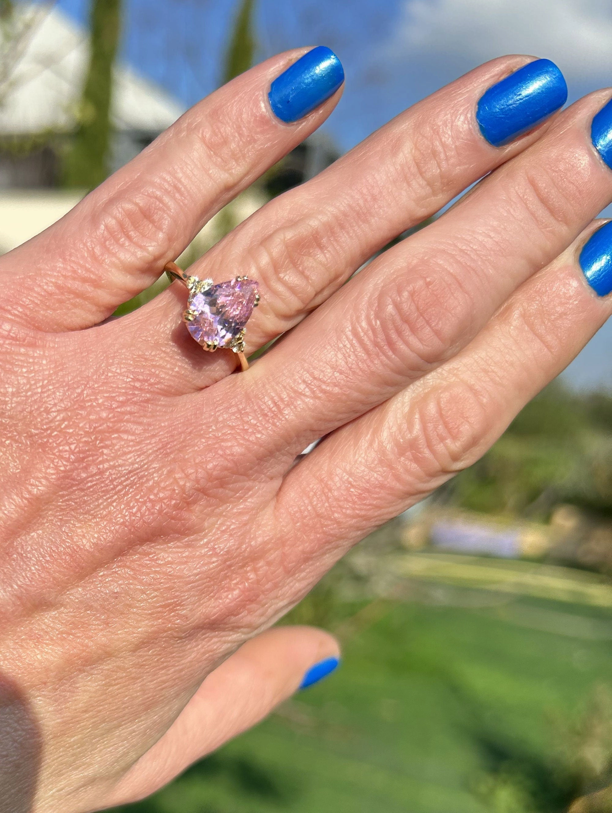 October Birthstone Pear-Shaped Rose Quartz Ring with Clear Quartz Accents